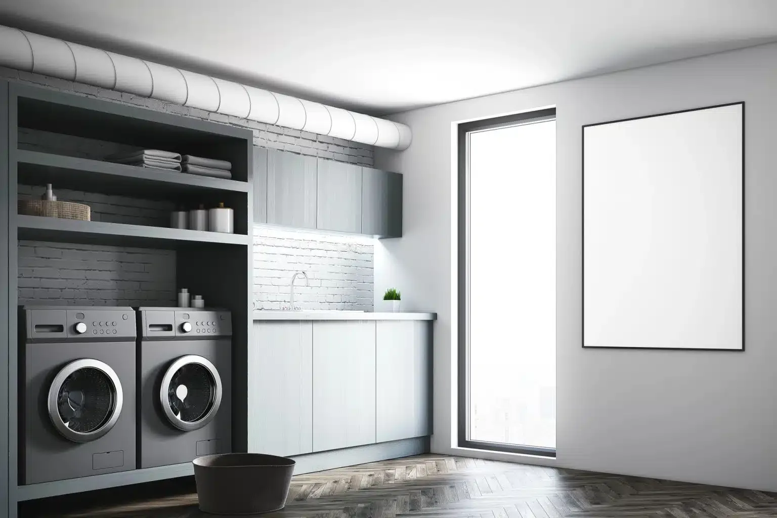 Light timber laundry cabinetry with a marble splashback